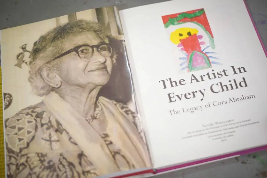 A child joyfully painting, embodying creativity and imagination, showcasing the artist within every young individual.