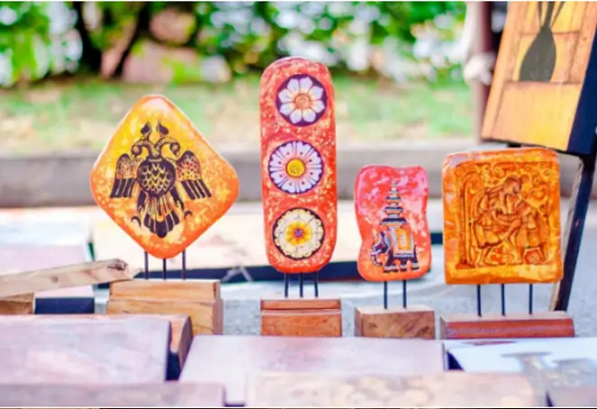 A table showcasing various wooden pieces, highlighting their unique textures and craftsmanship.