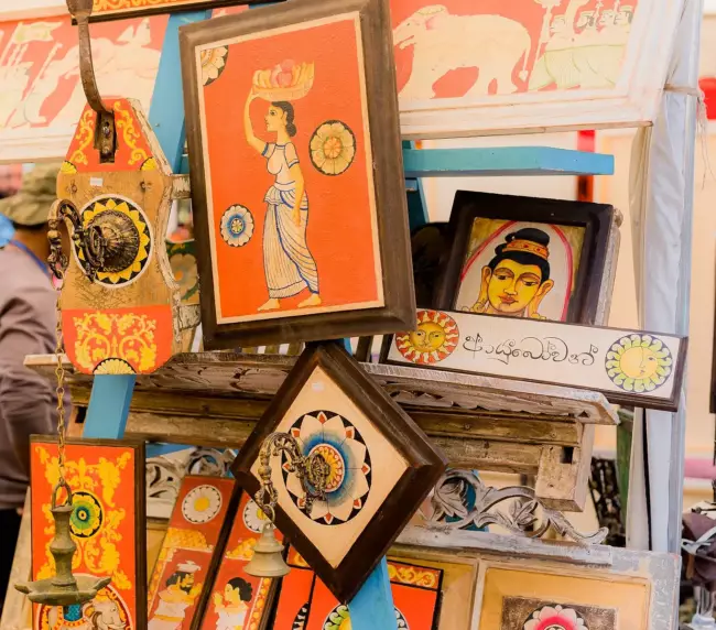 A vibrant display of various artworks showcasing creativity and artistic expression in a gallery setting.