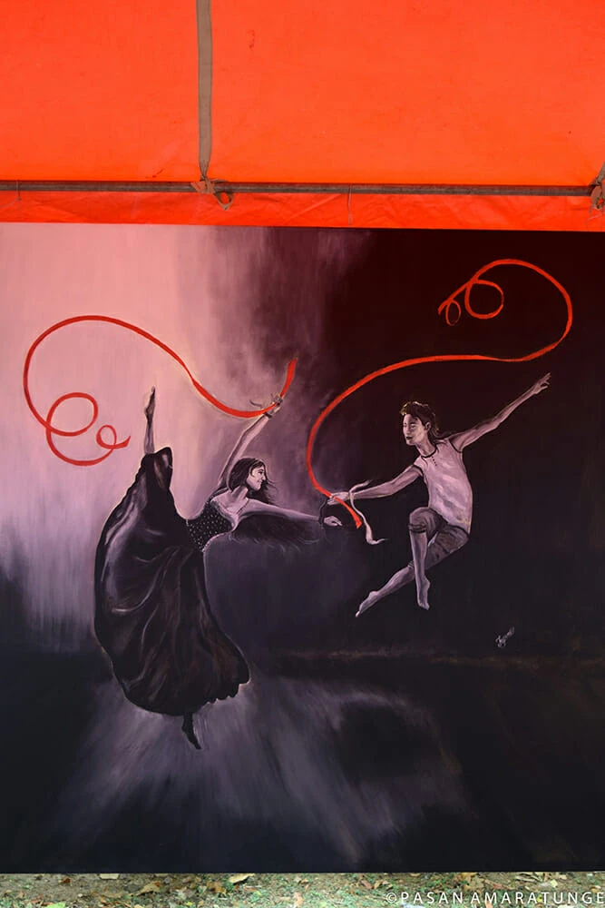 An artwork showcasing a couple dancing joyfully under a decorative tent.