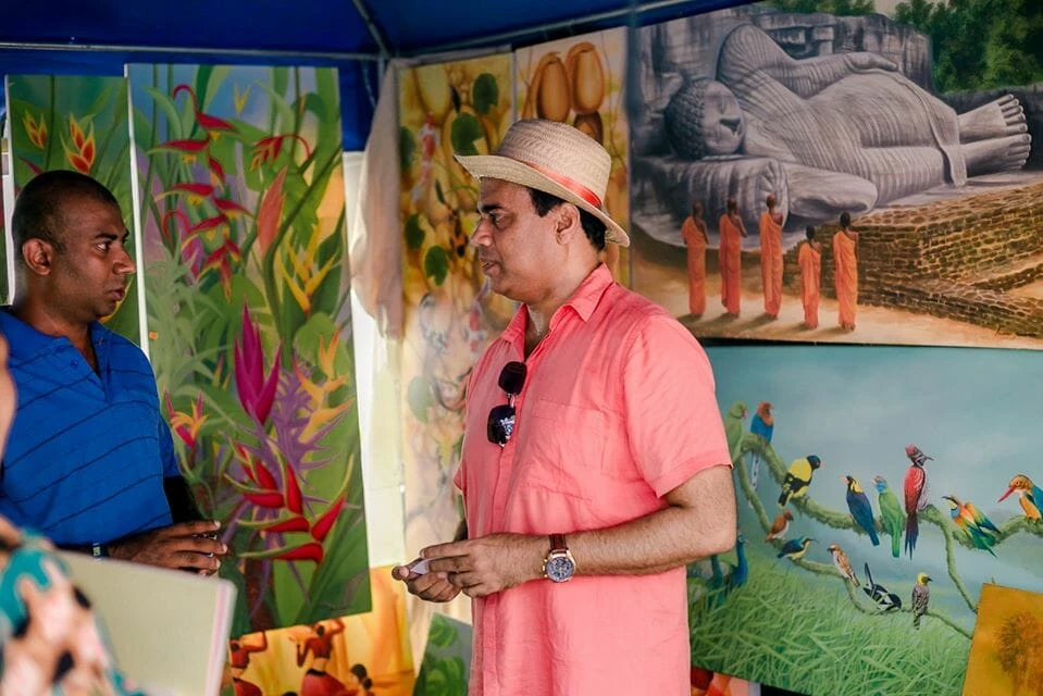 A woman actively handing out informational papers to participants at an event, fostering communication and engagement.