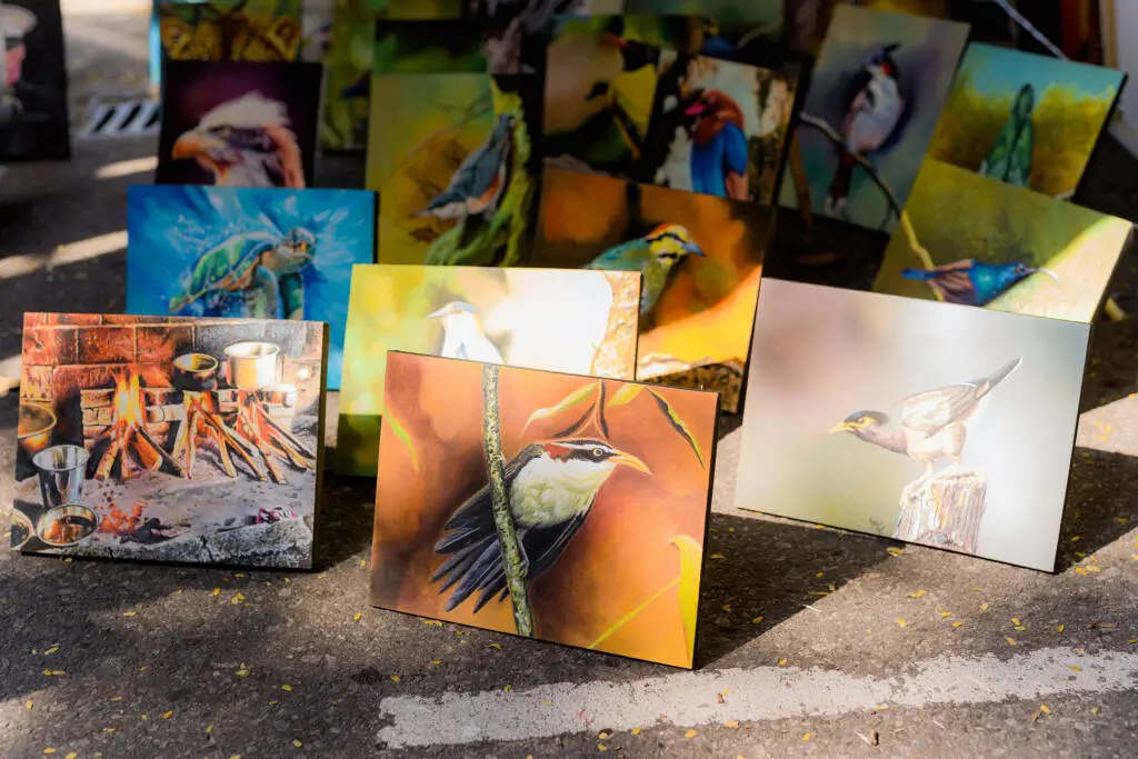 Appearing calm and content in a tranquil outdoor scene.