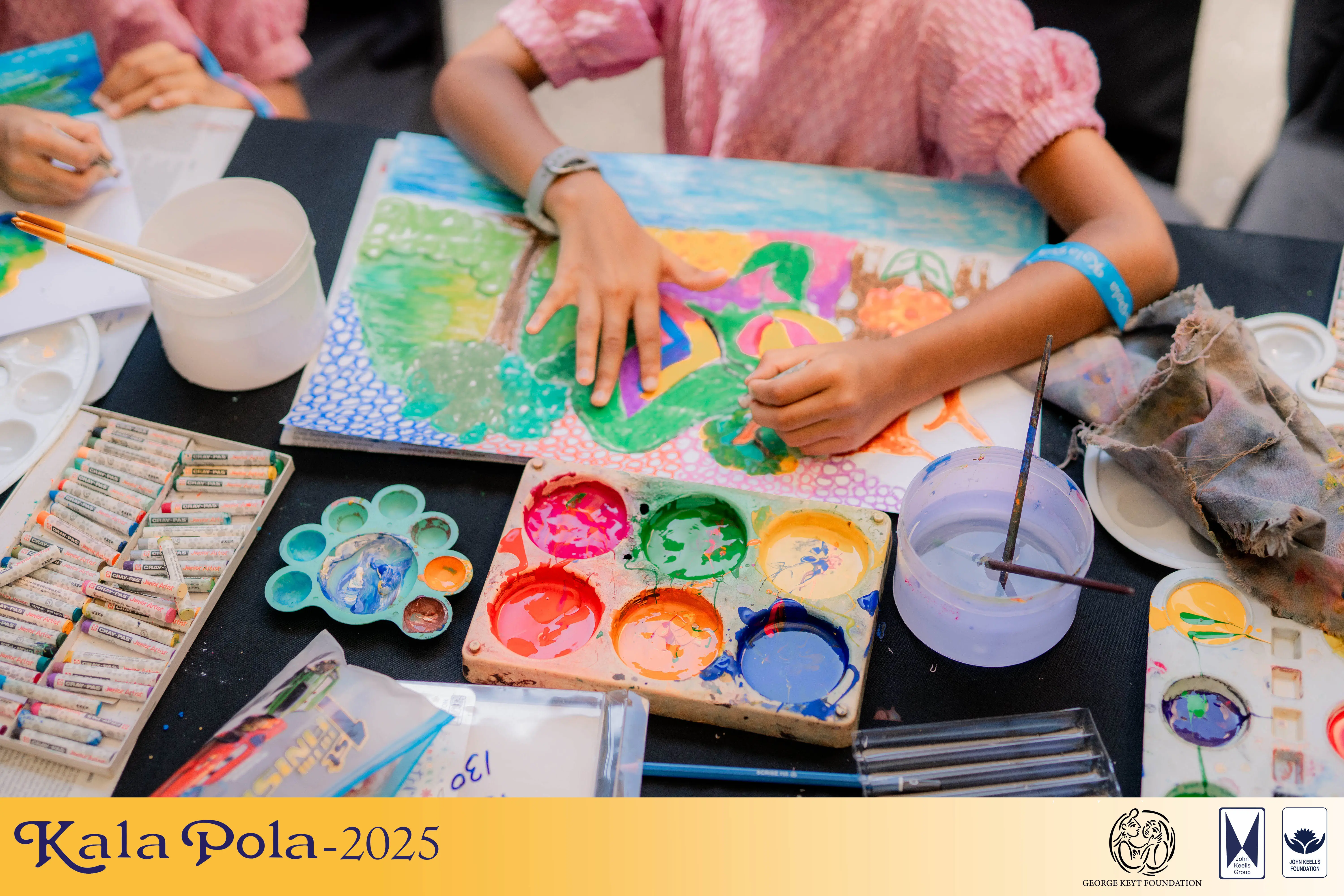 A man in a blue shirt delivers a speech confidently at a podium, engaging the audience with his presentation.