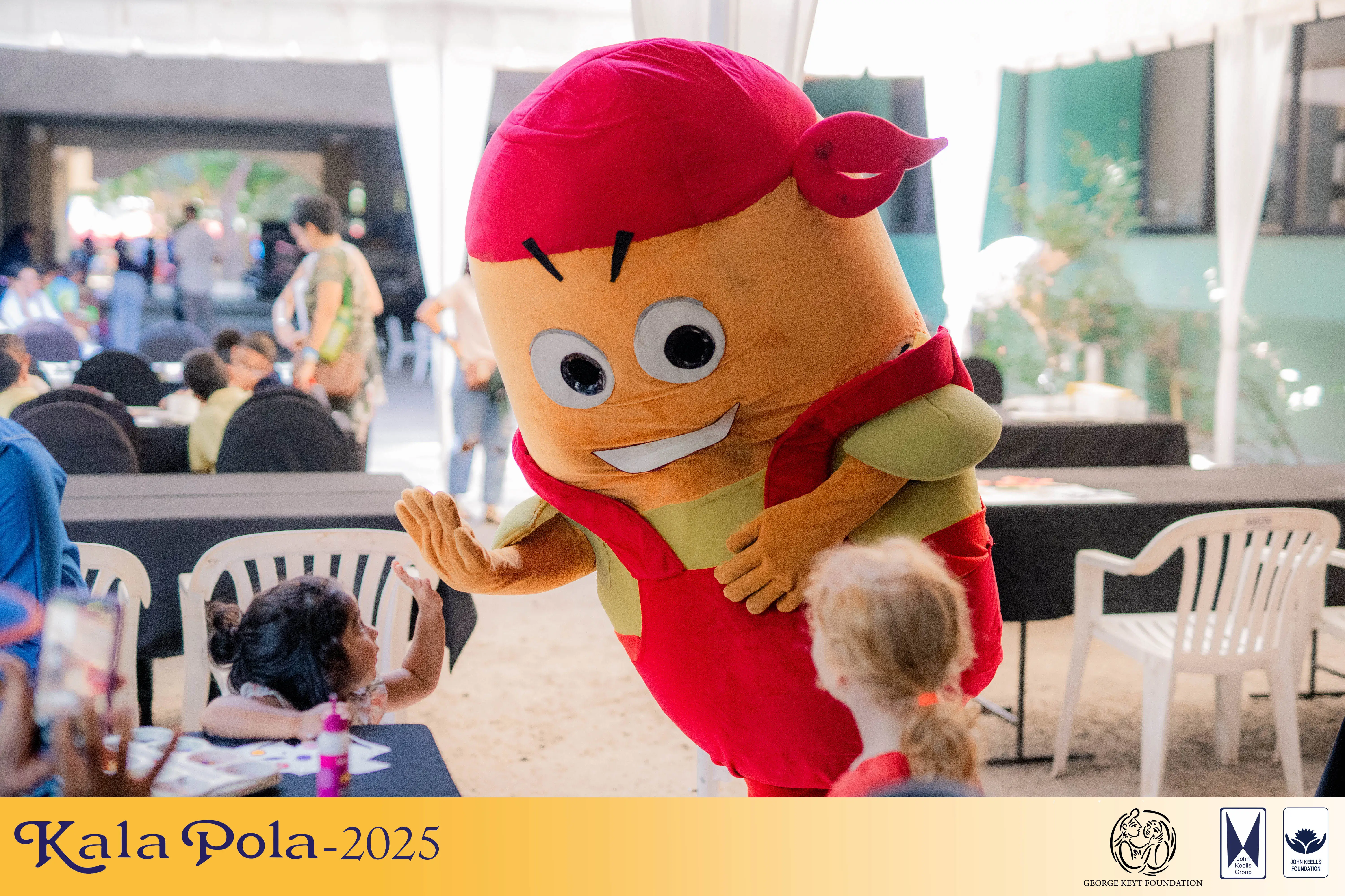 Two men positioned at a podium, surrounded by flowers, likely participating in a formal event or speech.