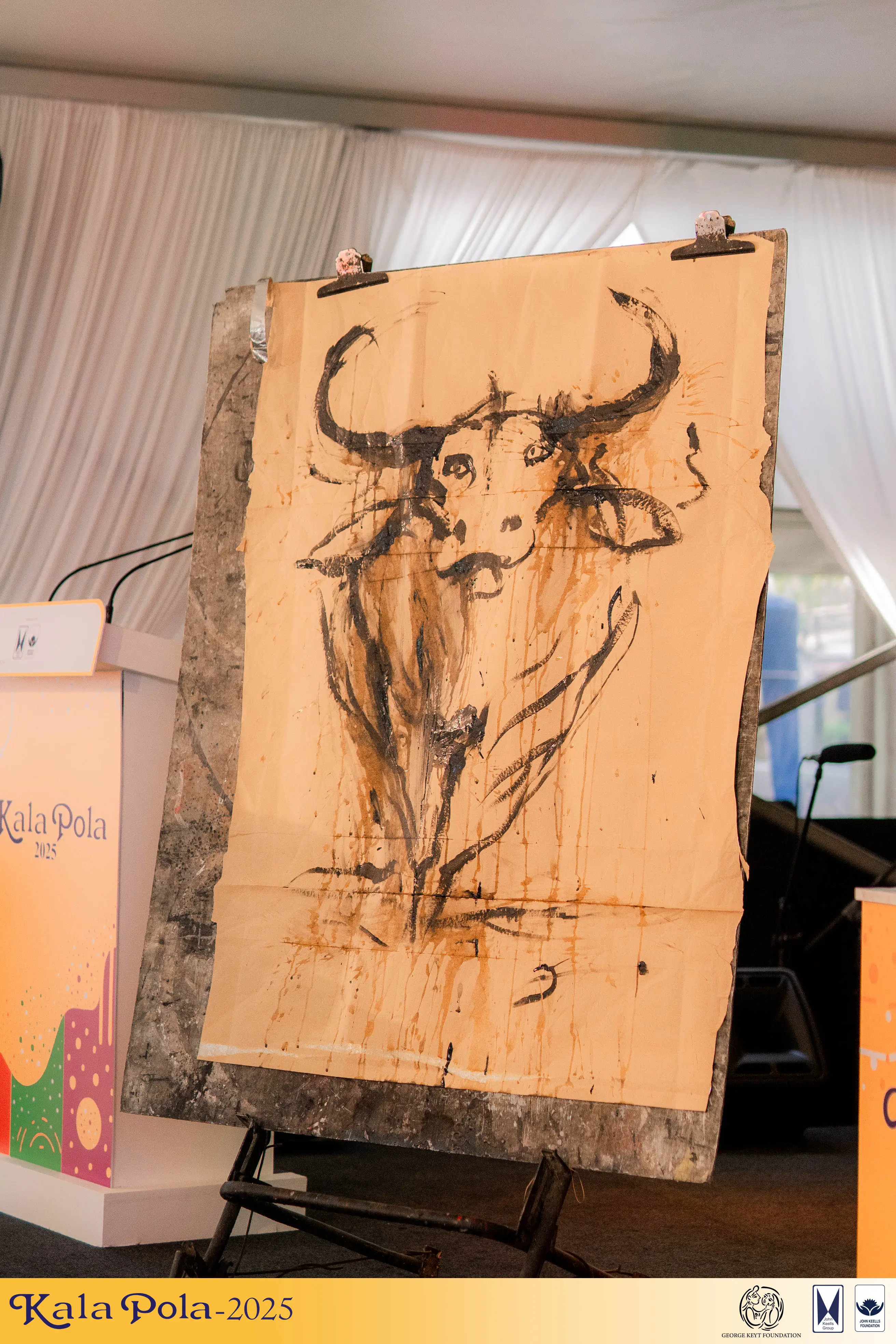 A man energetically playing drums, showcasing his passion for music and rhythm.