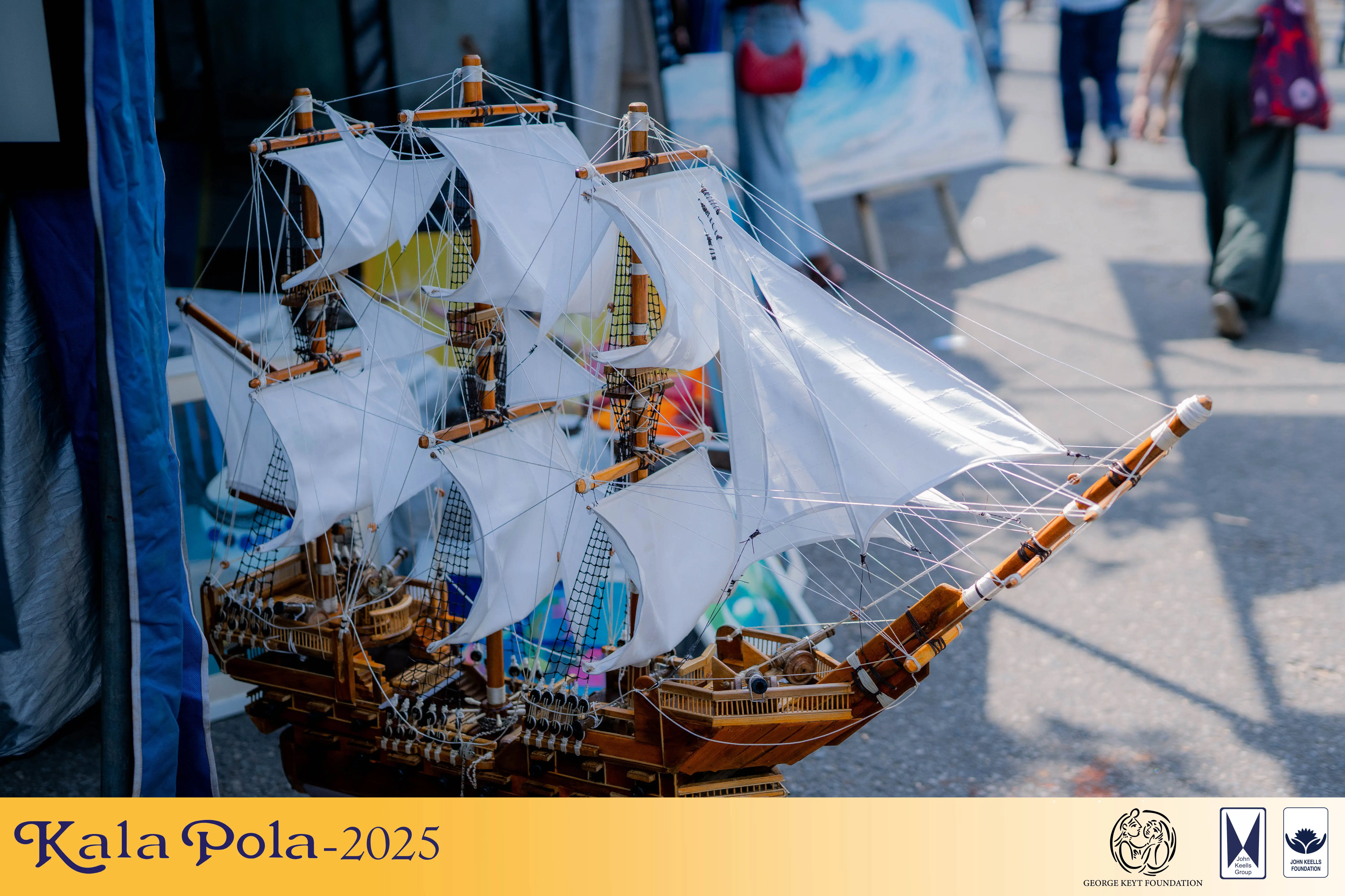 An African woman skillfully painting on a canvas, showcasing her artistic talent and cultural expression.